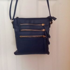 Brand new Pisces purse, deep zippered bag with 3 outside zippered pockets blue